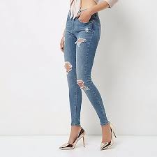 Ripped Jeans Fashion Ideas: What Should Women Wear With Torn Jeans?